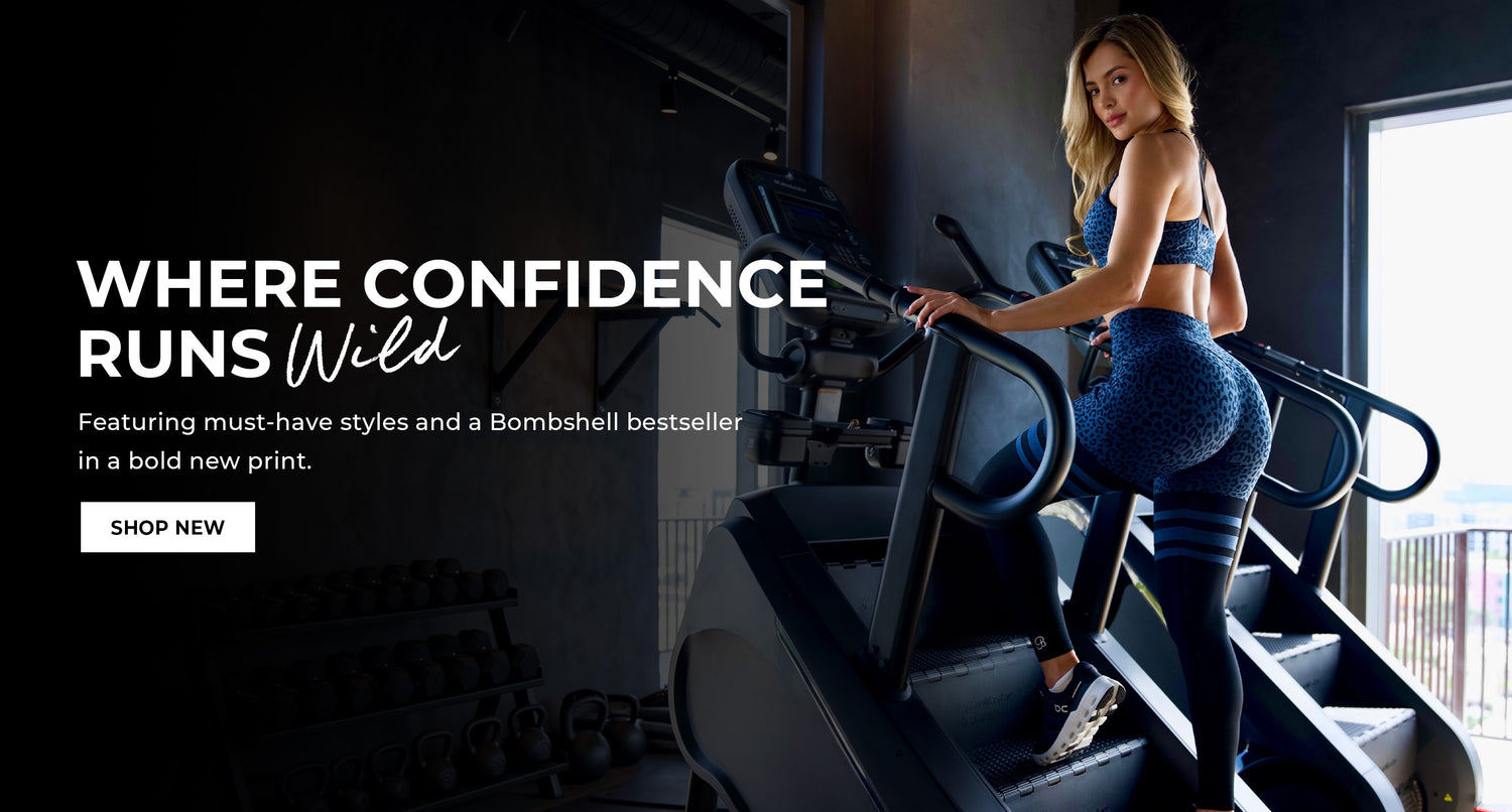 Woman exercising on a stair climber machine wearing the Night Sky Cheetah matching activewear bra and leggings. Text overlay says WHERE CONFIDENCE RUNS WILD featuring must-have styles and a Bombshell bestseller in a bold new print. SHOP NEW