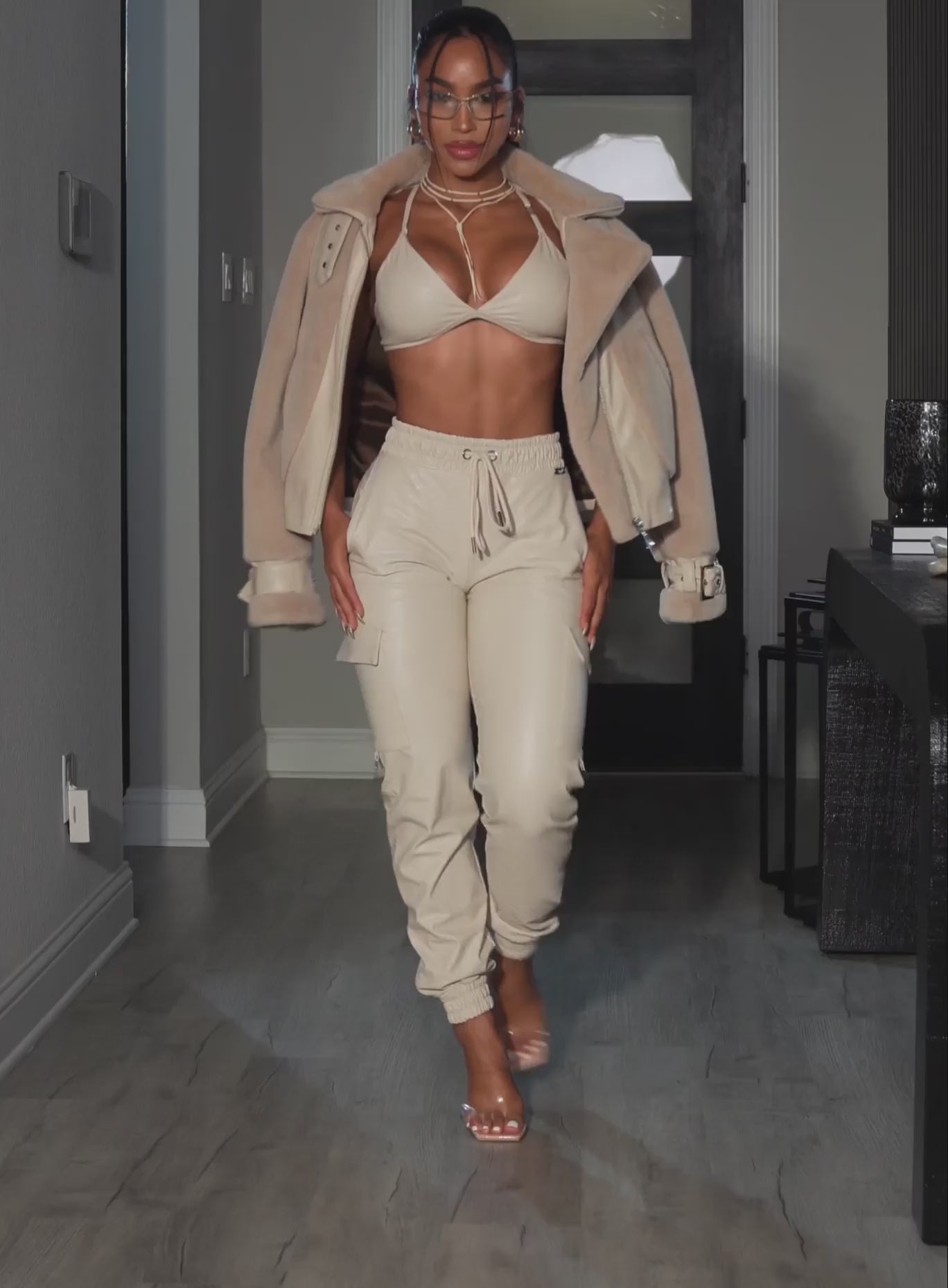 Champagne Liquid Cargos in high-gloss pleather with a sculpting high-waist and utility pockets.