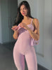 a short video of a model styling wearing the flawless form bodysuit in pink paloma color