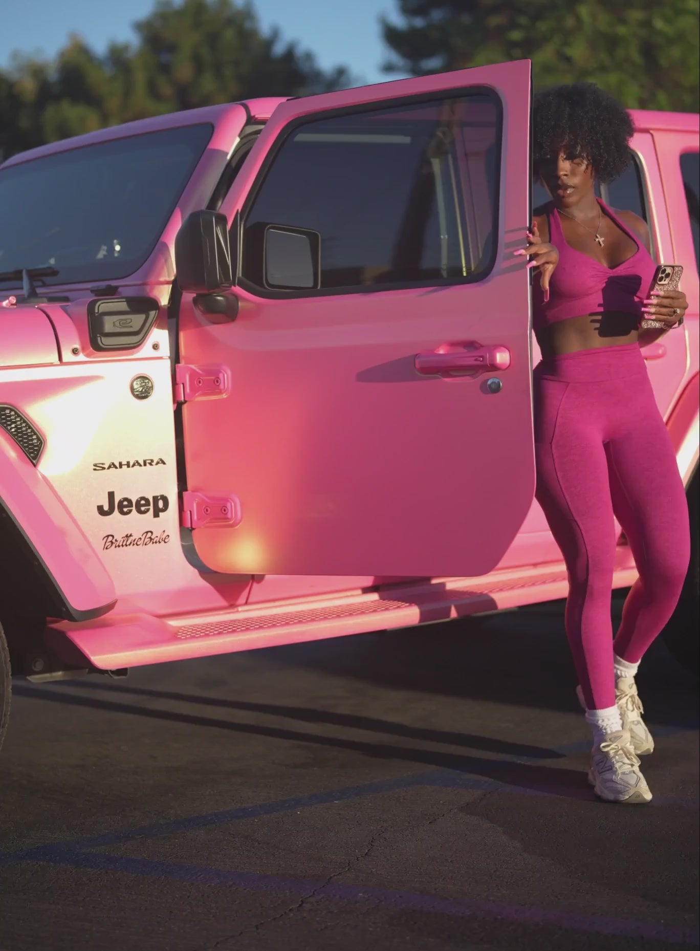 Fuchsia V Back Leggings and matching bra featuring a high-waisted fit and sculpting V-scrunch back.