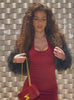 Short video showcase of a model wearing the Shimmer Seamless Dress in Red hot star color