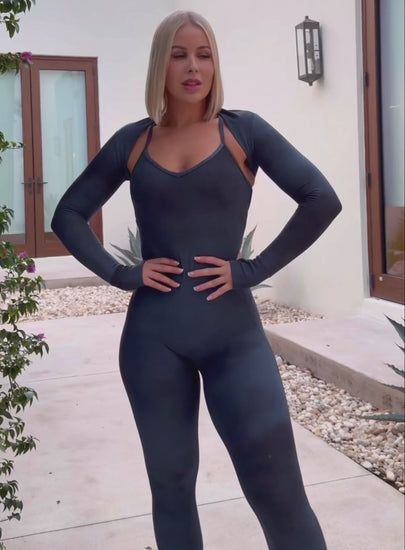 A short video of a model showing how comfortable our shape shrug is along with the full length bodysuit in vintage blue color 