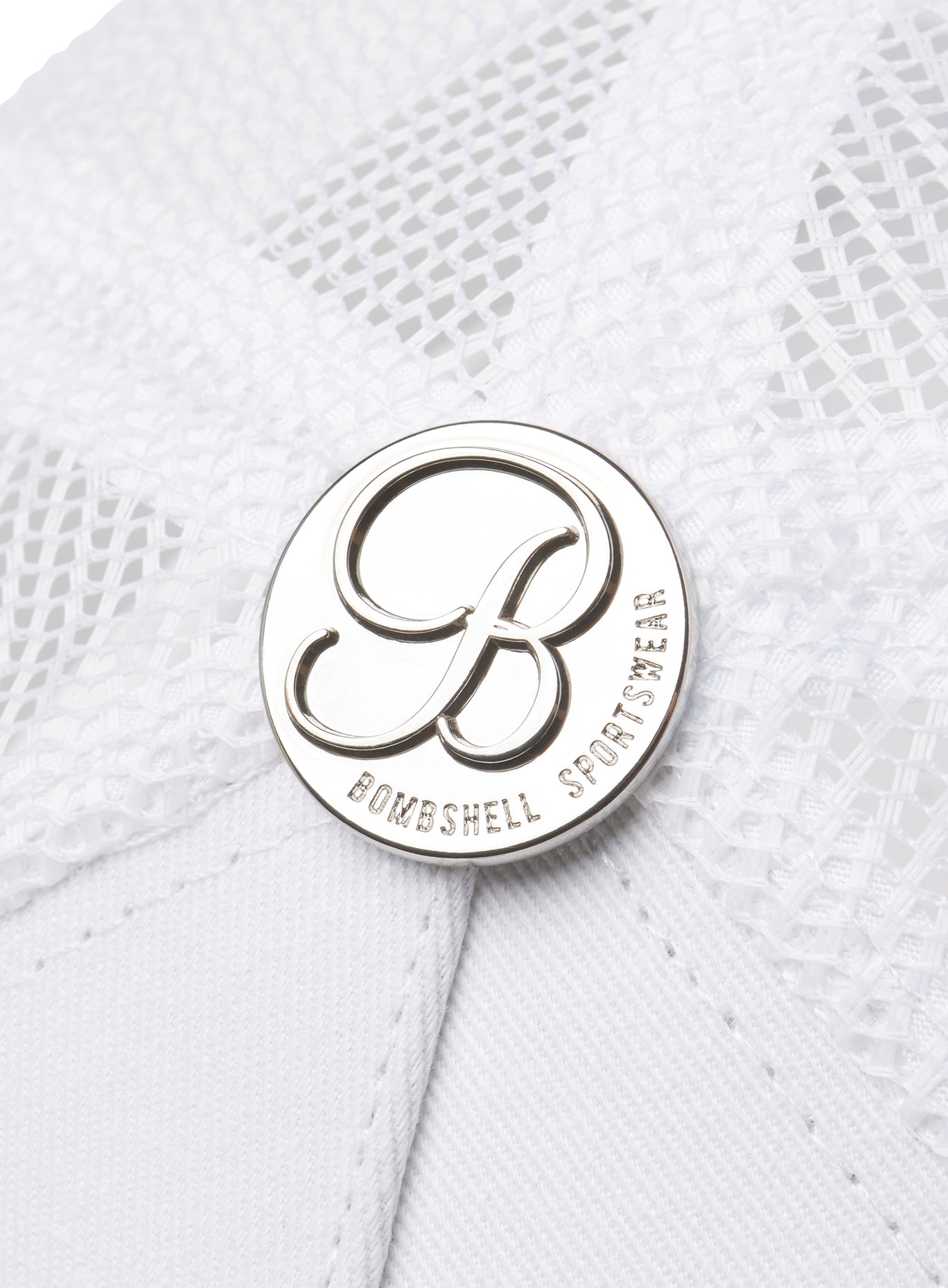 Zoomed in picture of the bombshell logo on our white bombshell hat 