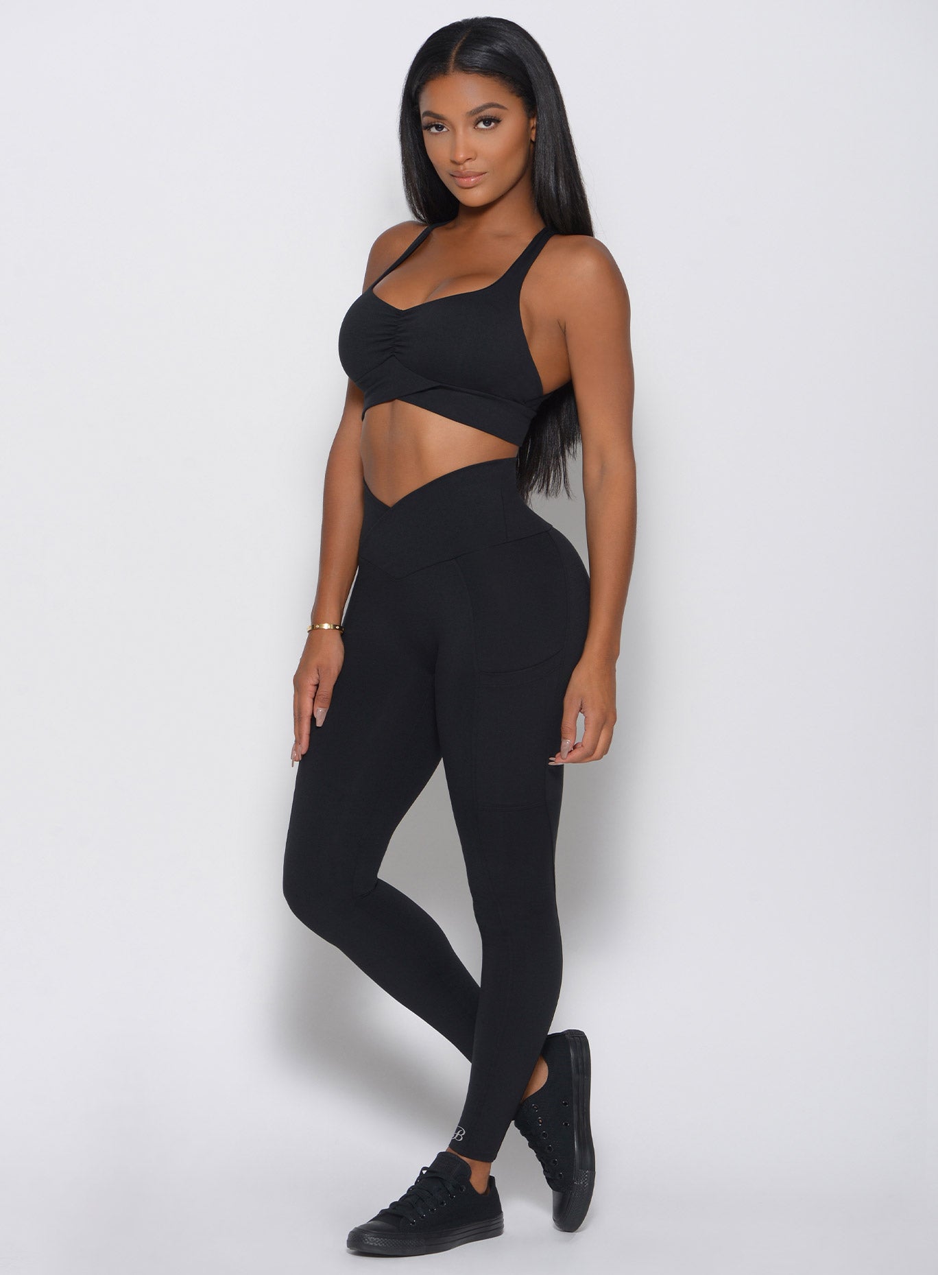 Black high-waisted Contour Leggings; seamless, squat-proof fabric for a sculpted gym fit.