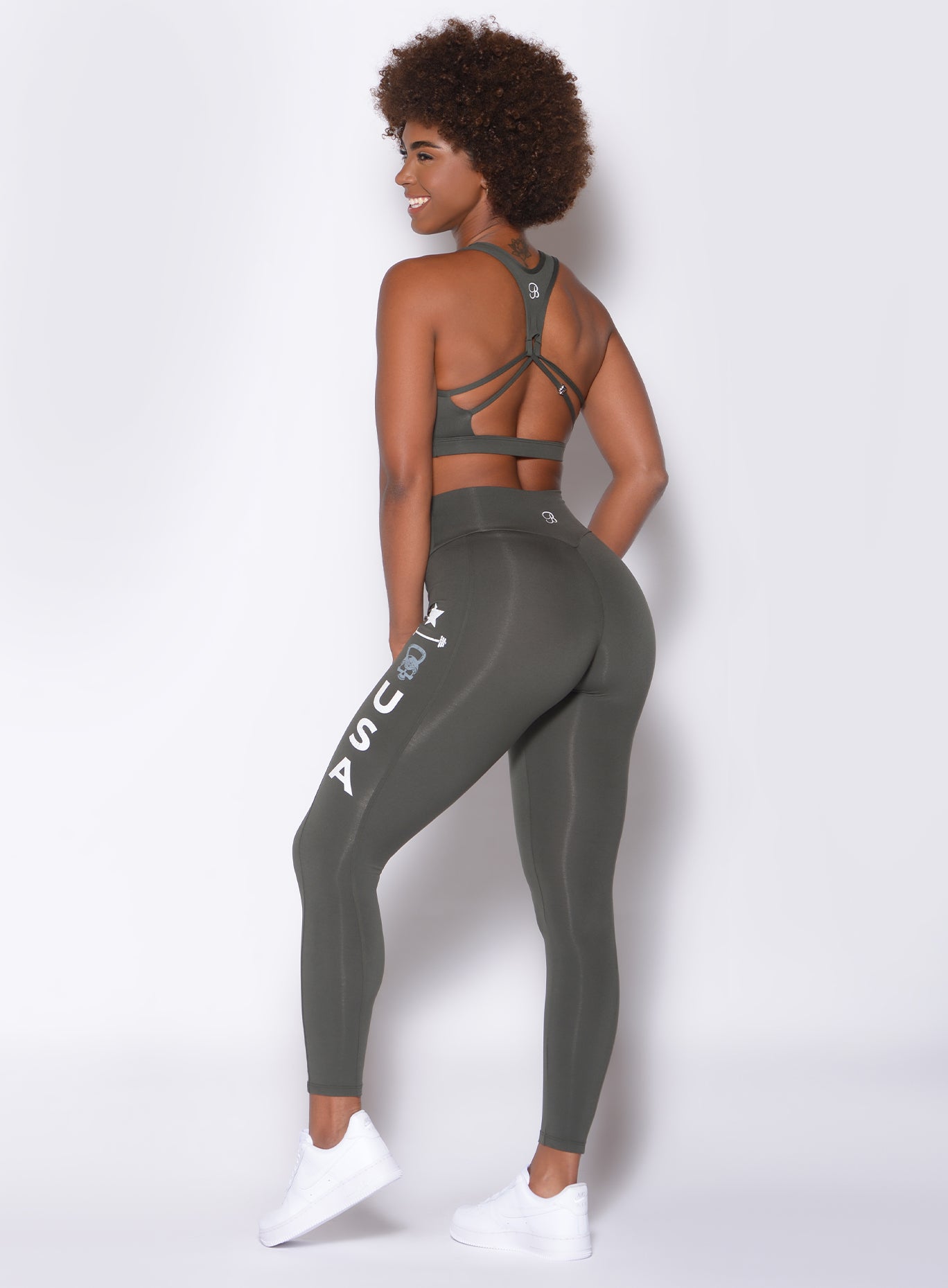 side view of model wearing our printed killing it leggings and matching sports bra