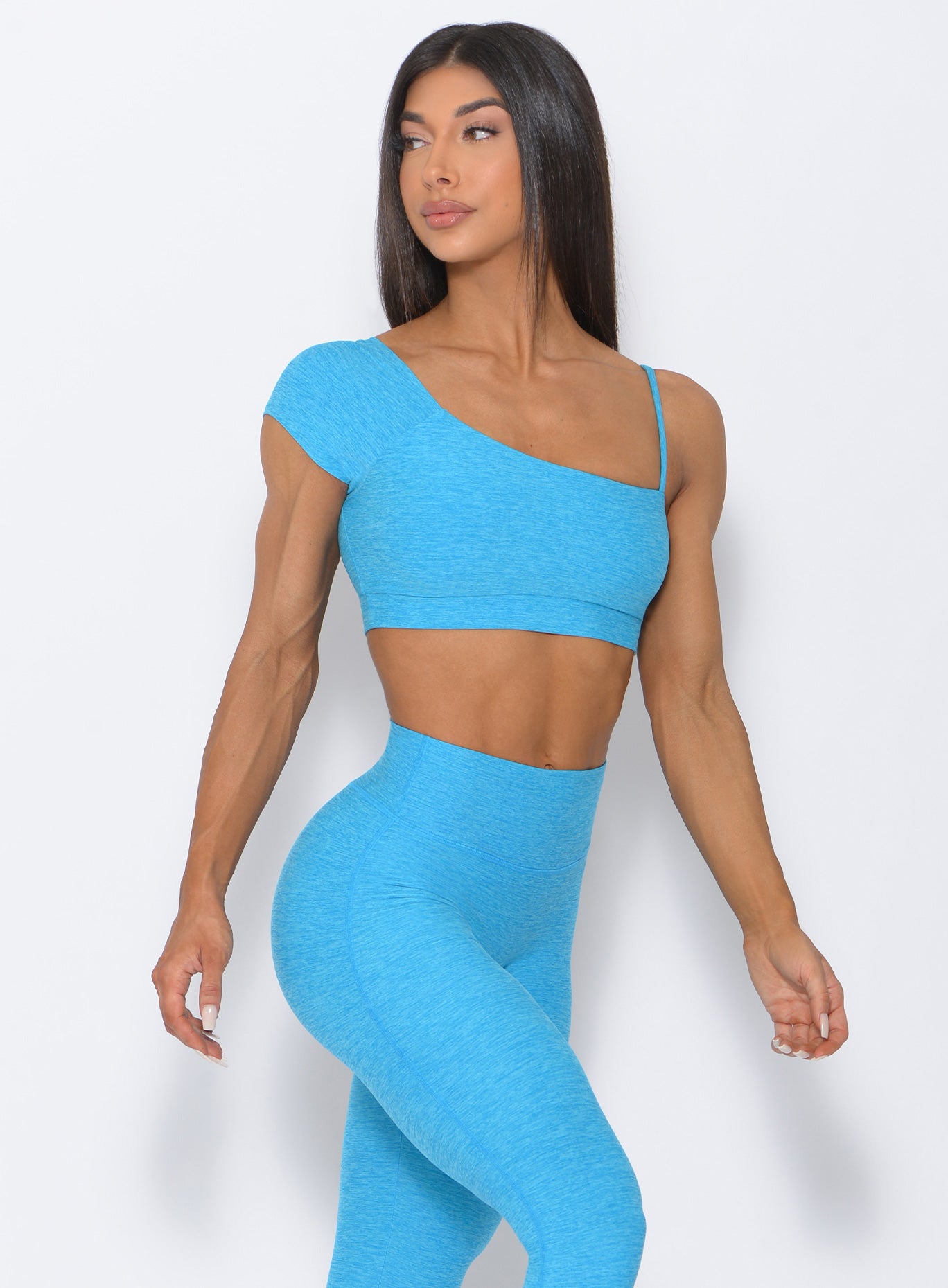 Front view of the model wearing our Adore Sports Bra  in icy blue and a matching leggings 