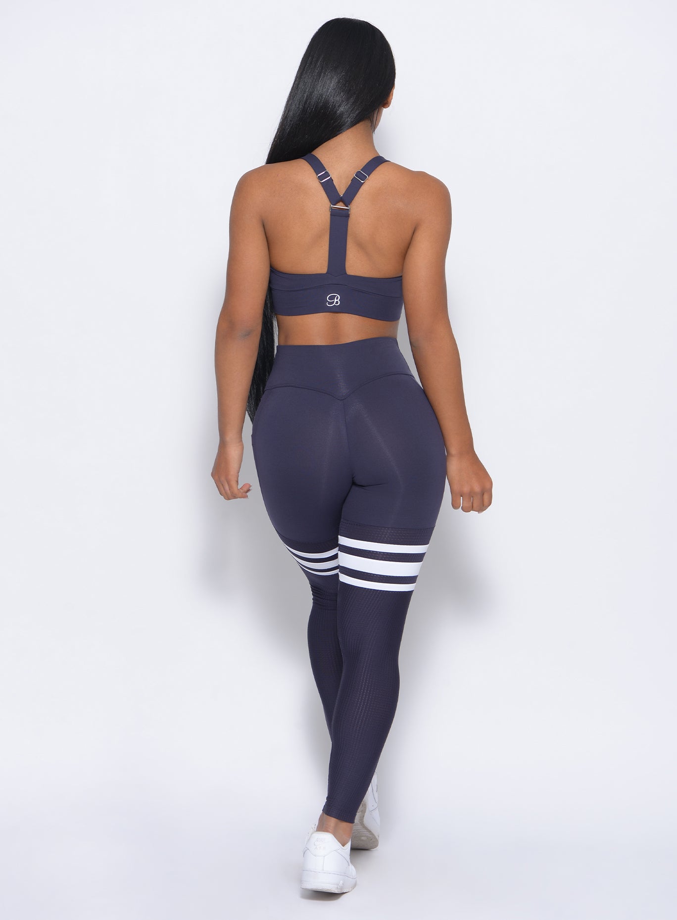 Sculpting Twilight Blue Perform Thigh Highs with white stripes and a heart-shaped back seam.