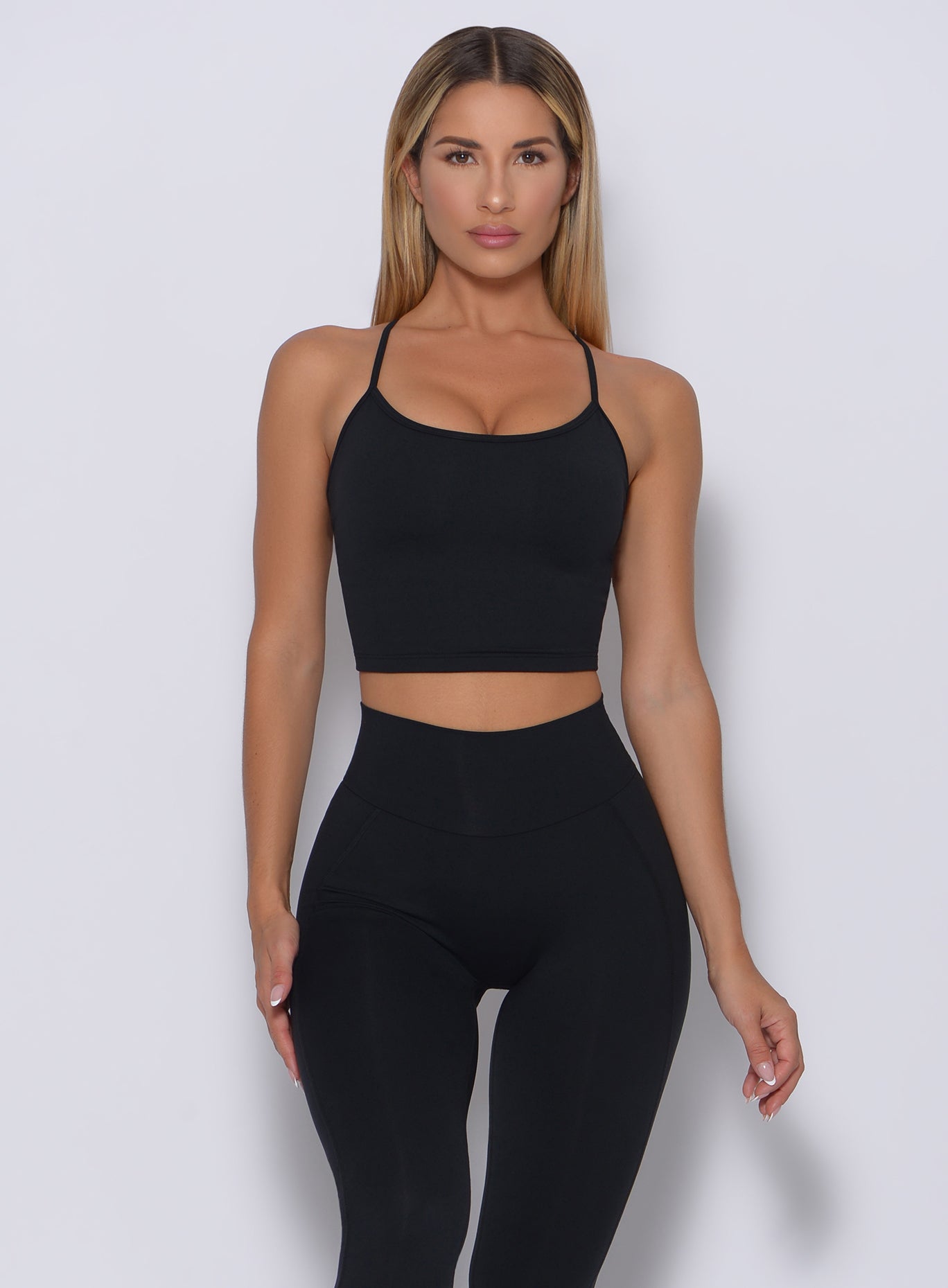 Black Relax Long Bra with sculpting high-waist leggings for a supportive, stylish gym set.