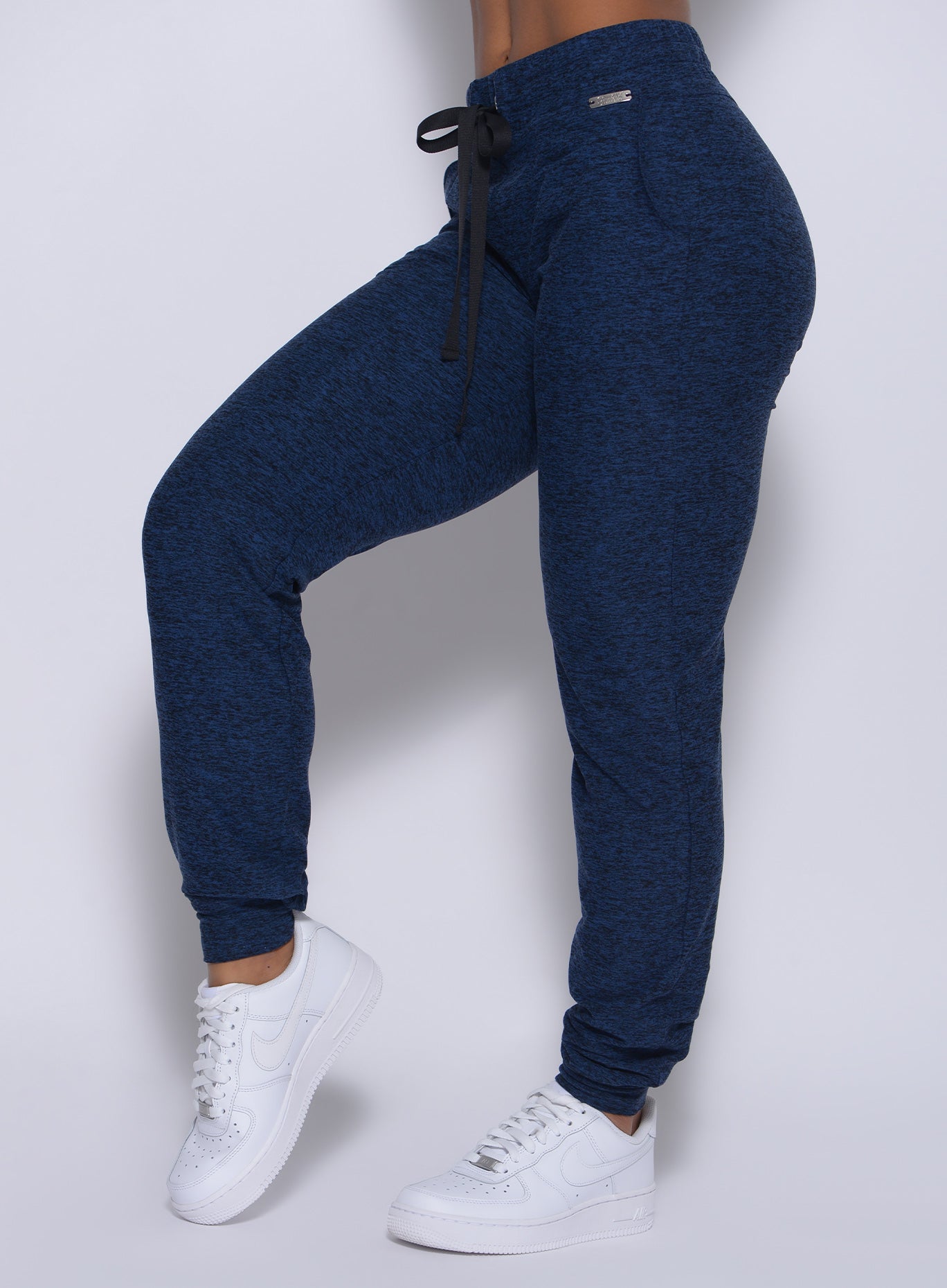 Zoomed in left side view of our signature joggers in sapphire blue color