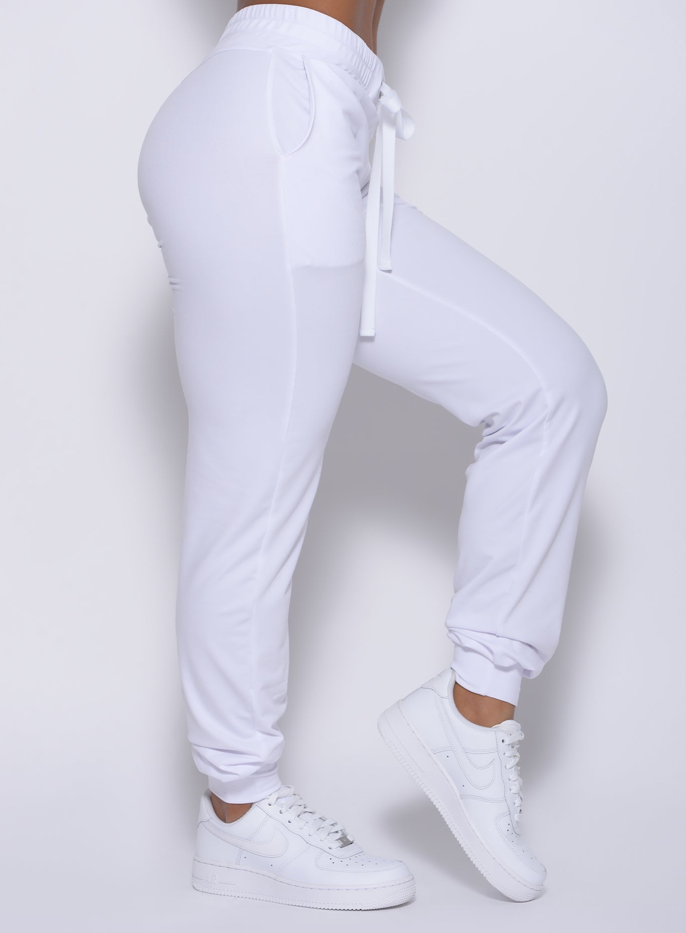 Zoomed in left right view of our white signature joggers 