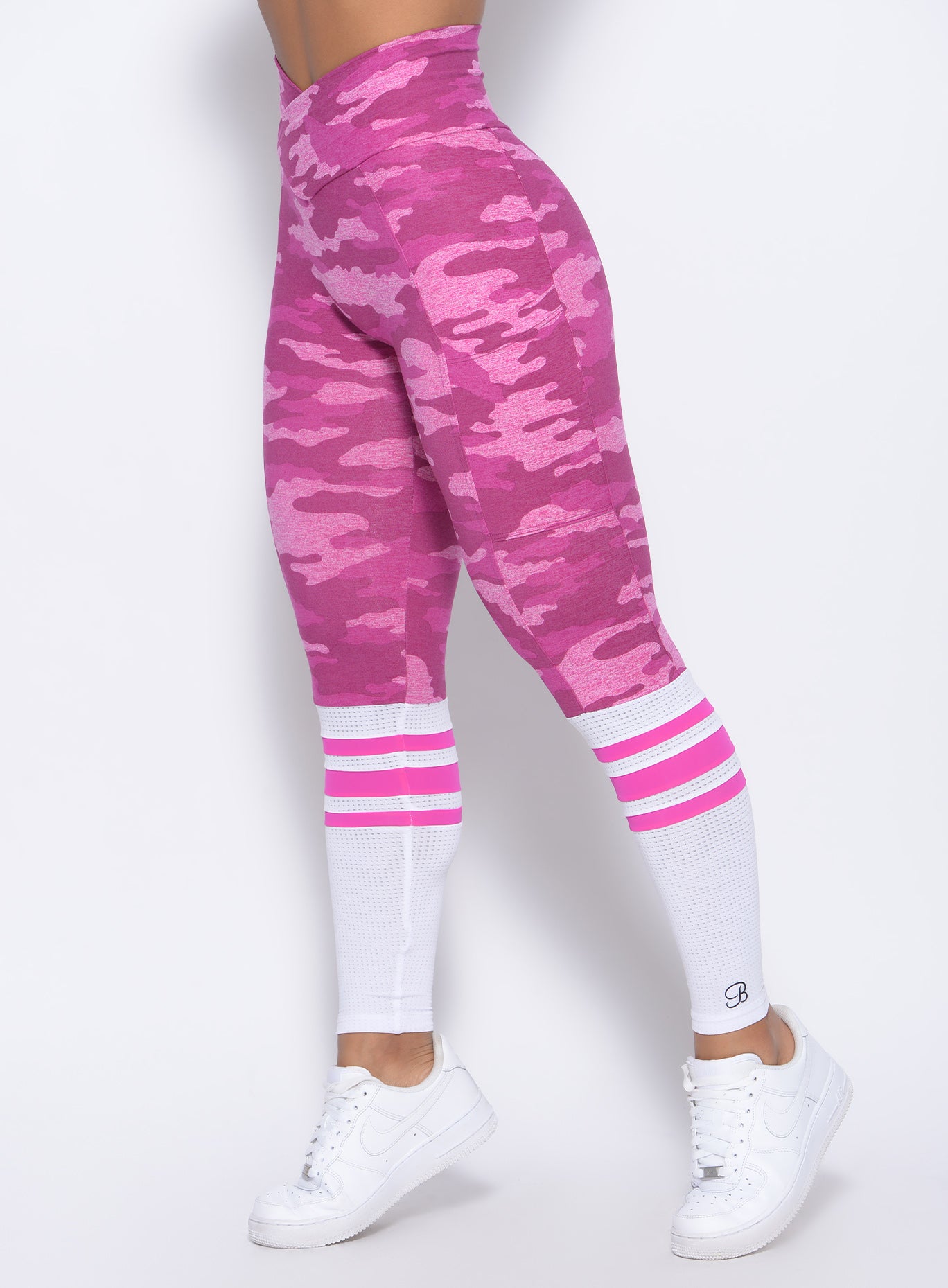 Zoomed in left side view of our pink camo contour sock leggings 