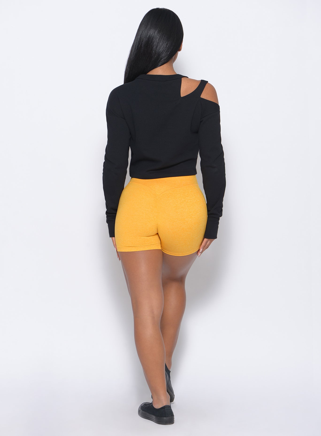 Sunkissed Tiny Waist Shorts with a V-cut waistband and sculpting back scrunch seam.