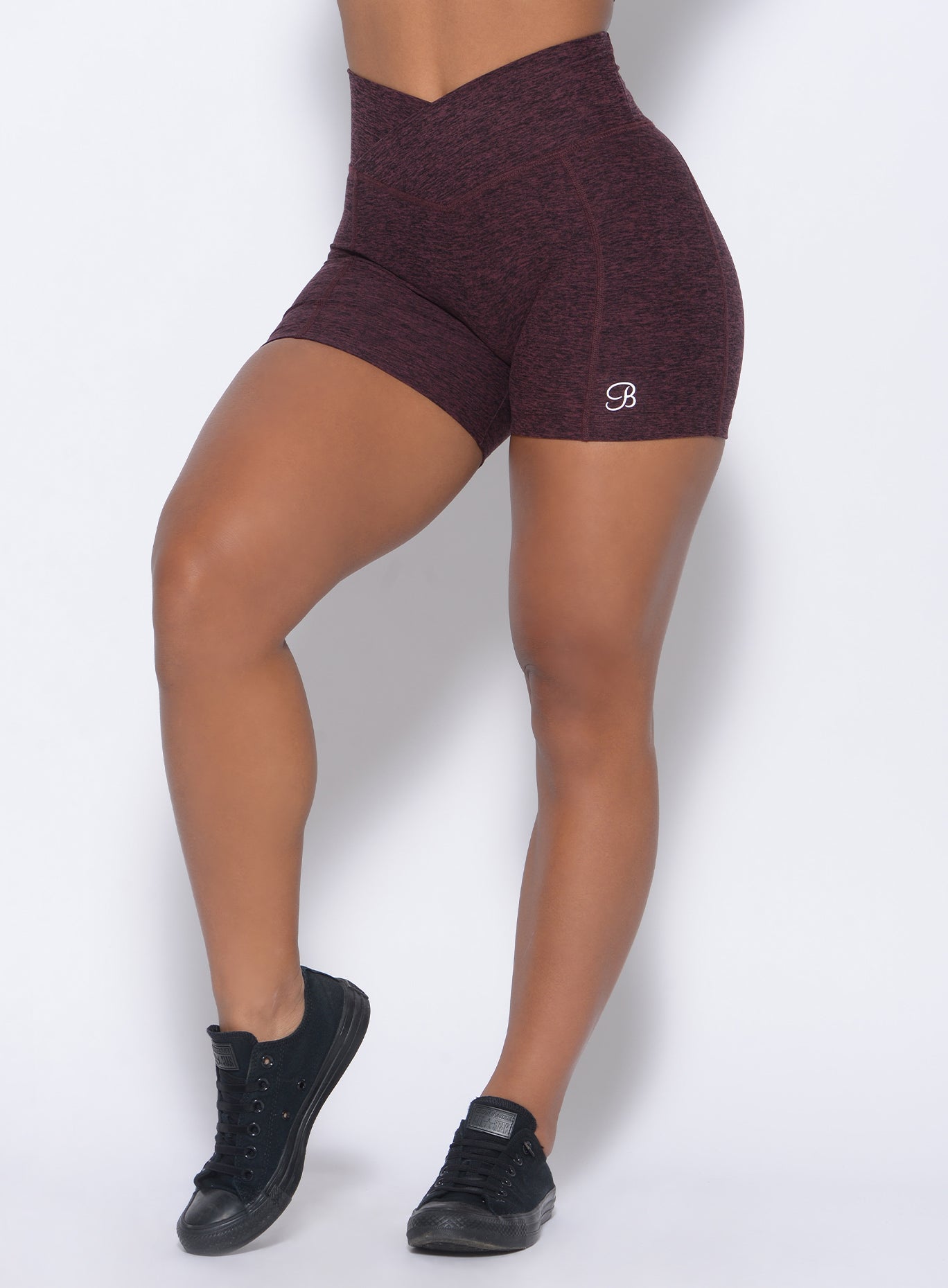 Zoomed in front view of the view of our tiny waist shorts in port color